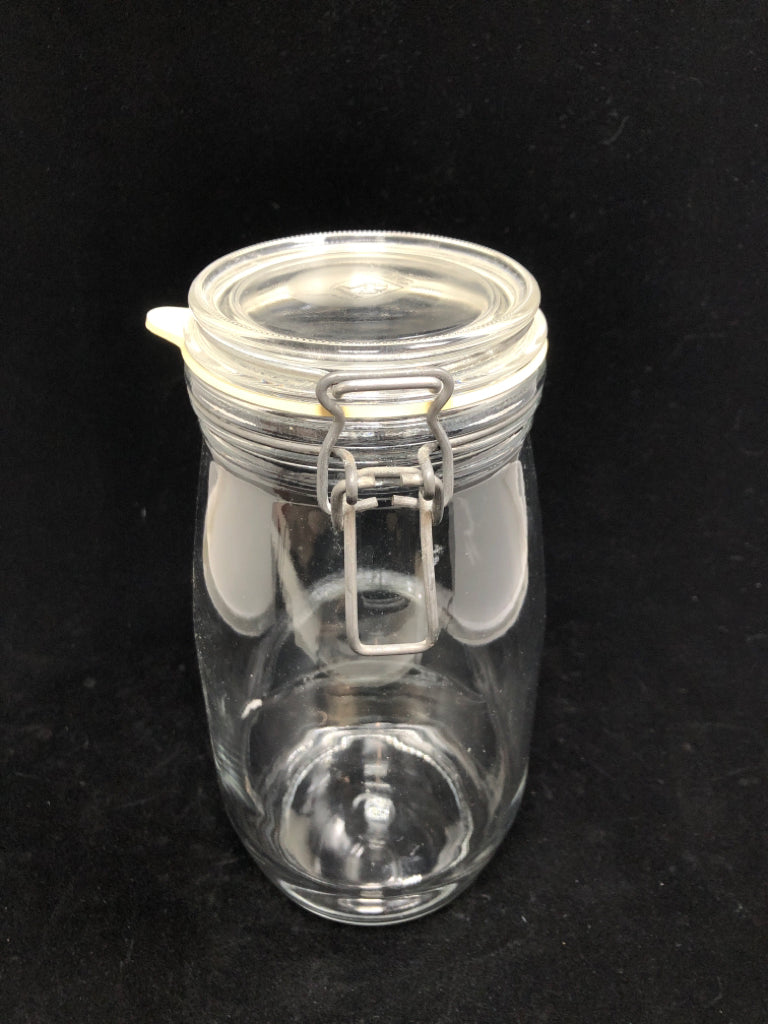 MED CLEAR GLASS JAR W/FLIP TOP LID.