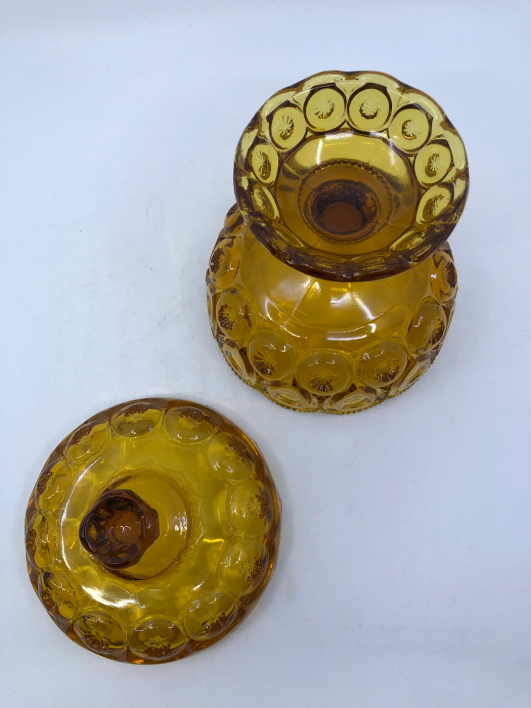 VTG FOOTED AMBER GLASS EMBOSSED CANDY DISH.