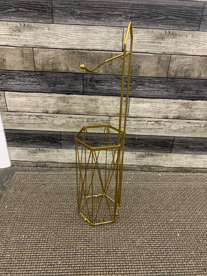 GOLD HEXAGON TOILET PAPER HOLDER.