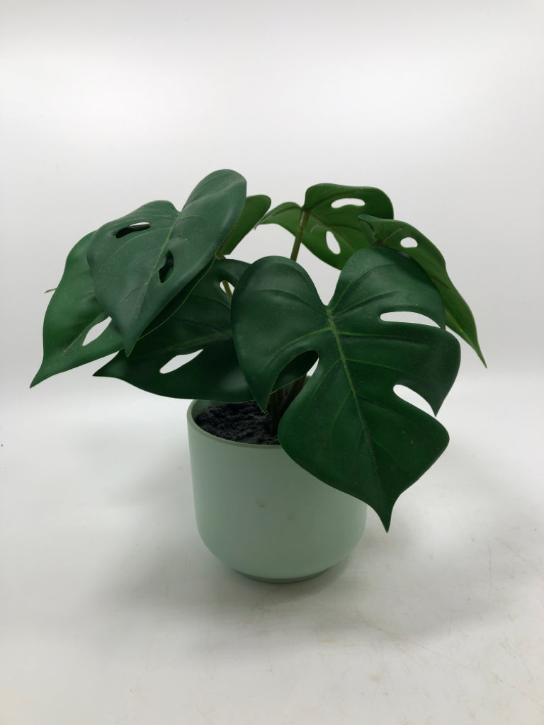 FAUX MONSTERA IN TEAL PLANTER.