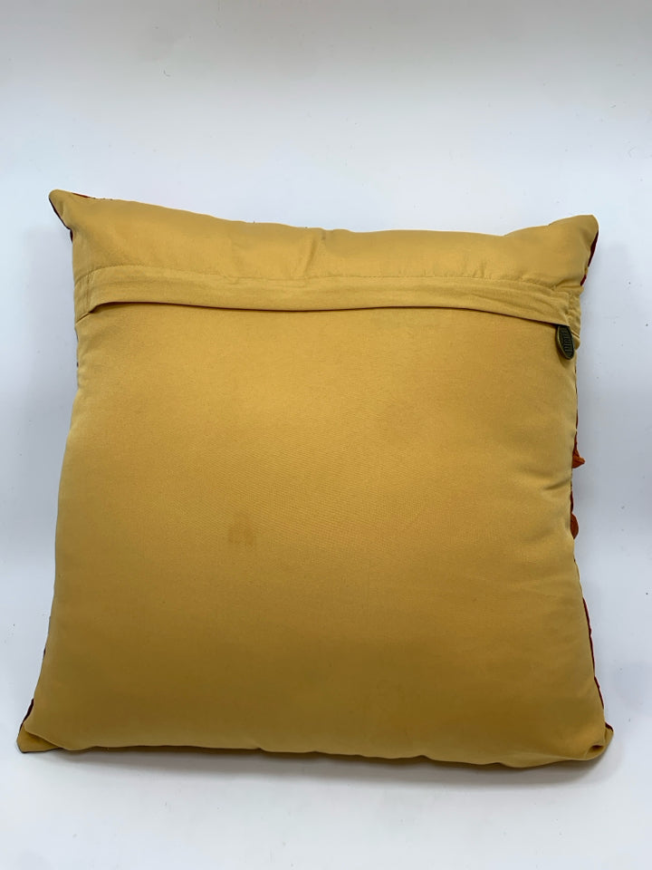 YELLOW W/RED PLEATED CIRCLES PILLOW.