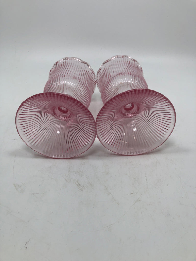 2 PINK RIBBED FLOWER SHAPED VOTIVE HOLDERS.