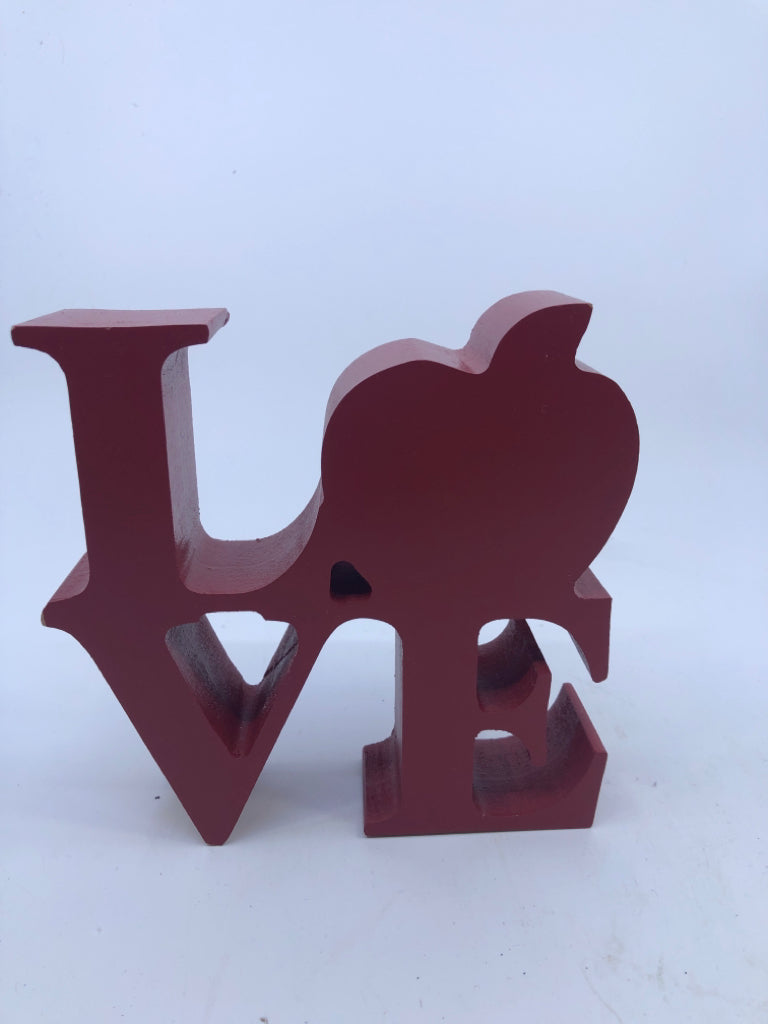 RED LOVE WITH APPLE BLOCK SIGN.