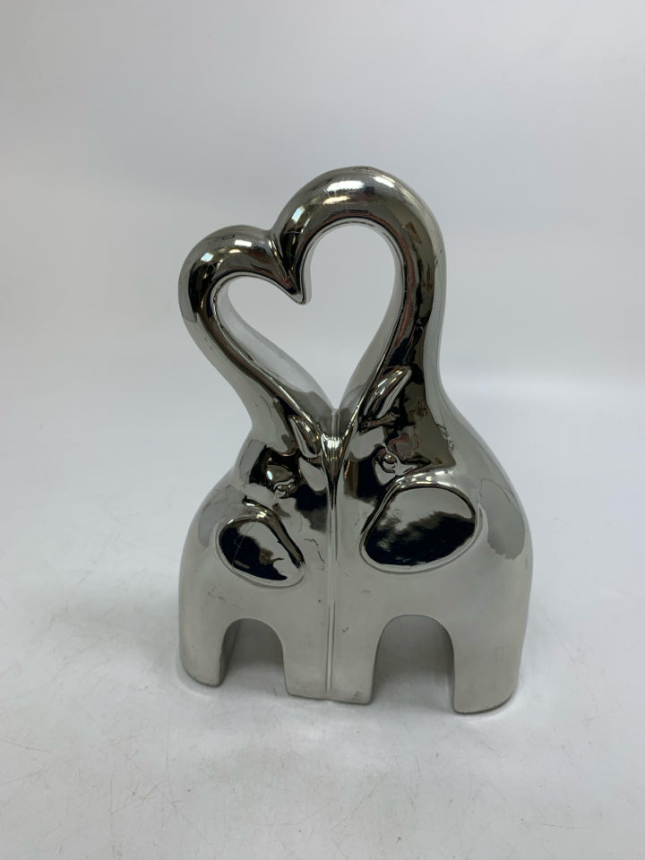 2 SILVER CERAMIC ELEPHANTS PUTTING TRUNKS TOGETHER.