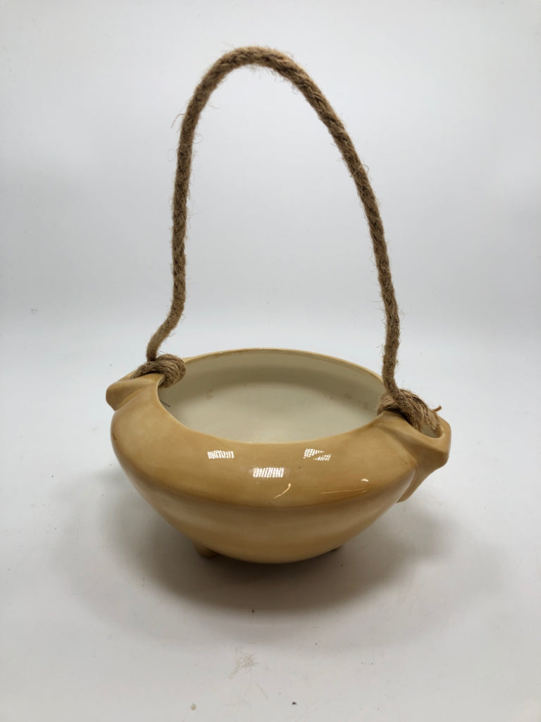 BROWN HANGING POTTER PLANTER.