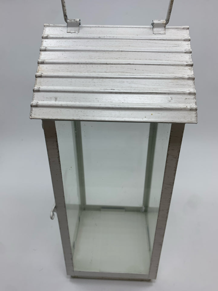 WHITE METAL CANDLE LANTERN.