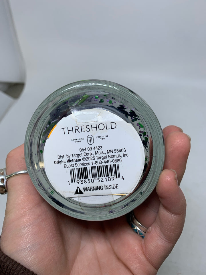 SMALL WITCH THEMED CANDLE.