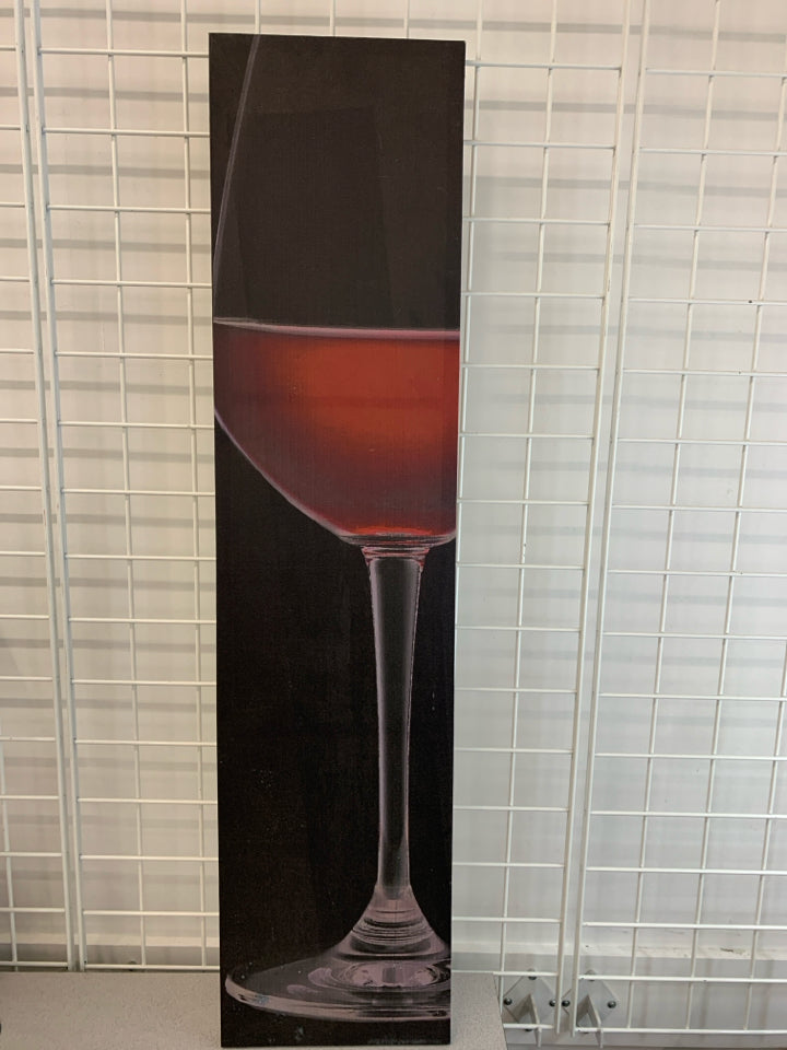 RED WINE IN GLASS ON CANVAS.