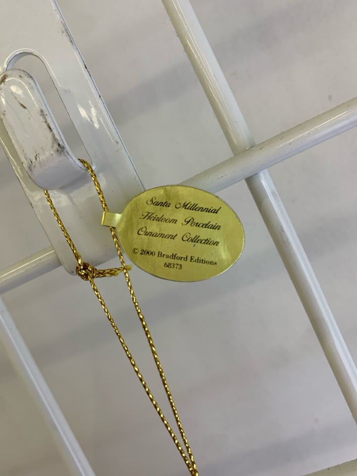 CERAMIC SPIRIT OF CHRISTMAS ORNAMENT.