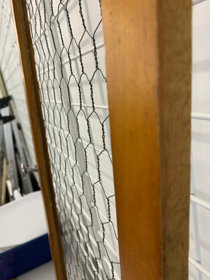 CHICKEN WIRE DECORATIVE DOOR.