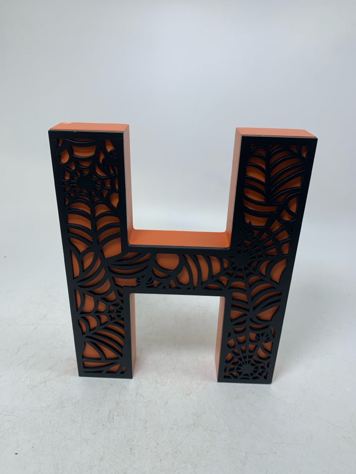 BLACK SPIDER WEB DESIGN MONOGRAM ORANGE H.