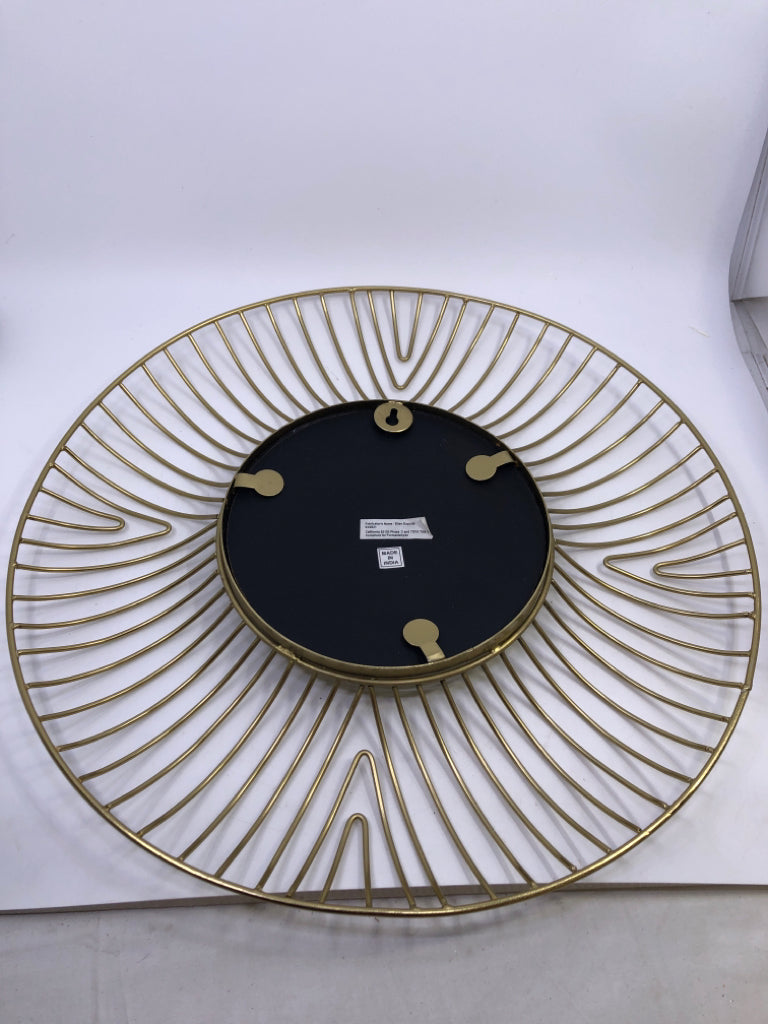 GOLD CIRCLE METAL MIRROR WALL ART.