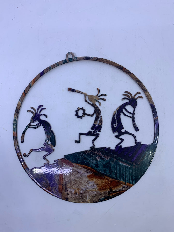 DECORATIVE METAL CIRCLE W 3 KOKOPELLI FIGURES.