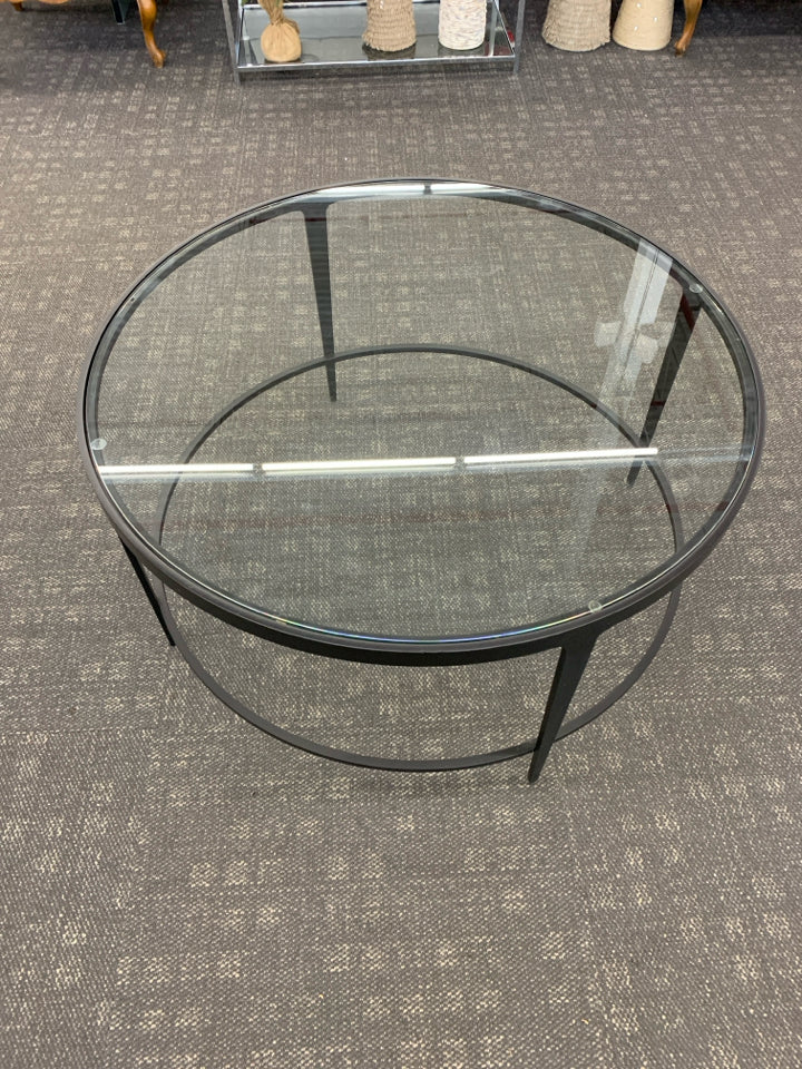 ROUND BLACK/GLASS COFFEE TABLE.