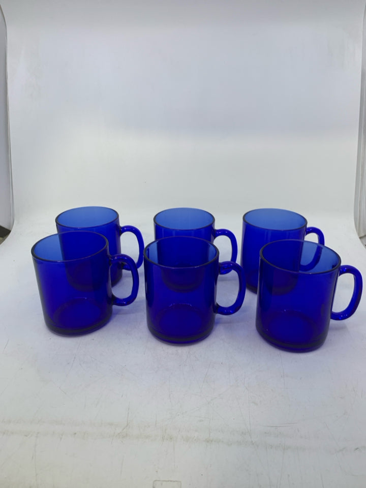 6 GLASS MUGS.