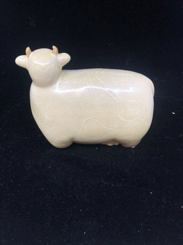 TAN CERAMIC COW.