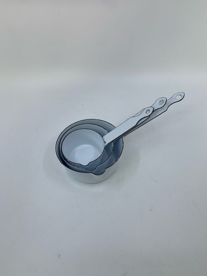 3 HEAVY NESTING ENAMEL WHITE SAUCE PANS.