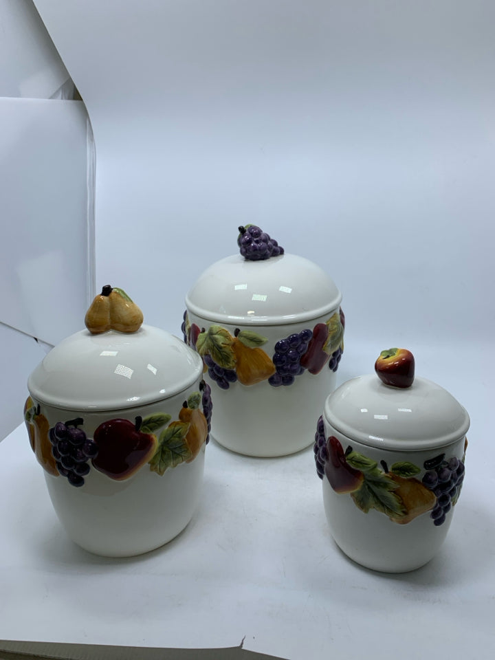3 CERAMIC EMBOSSED FRUIT CANISTERS.