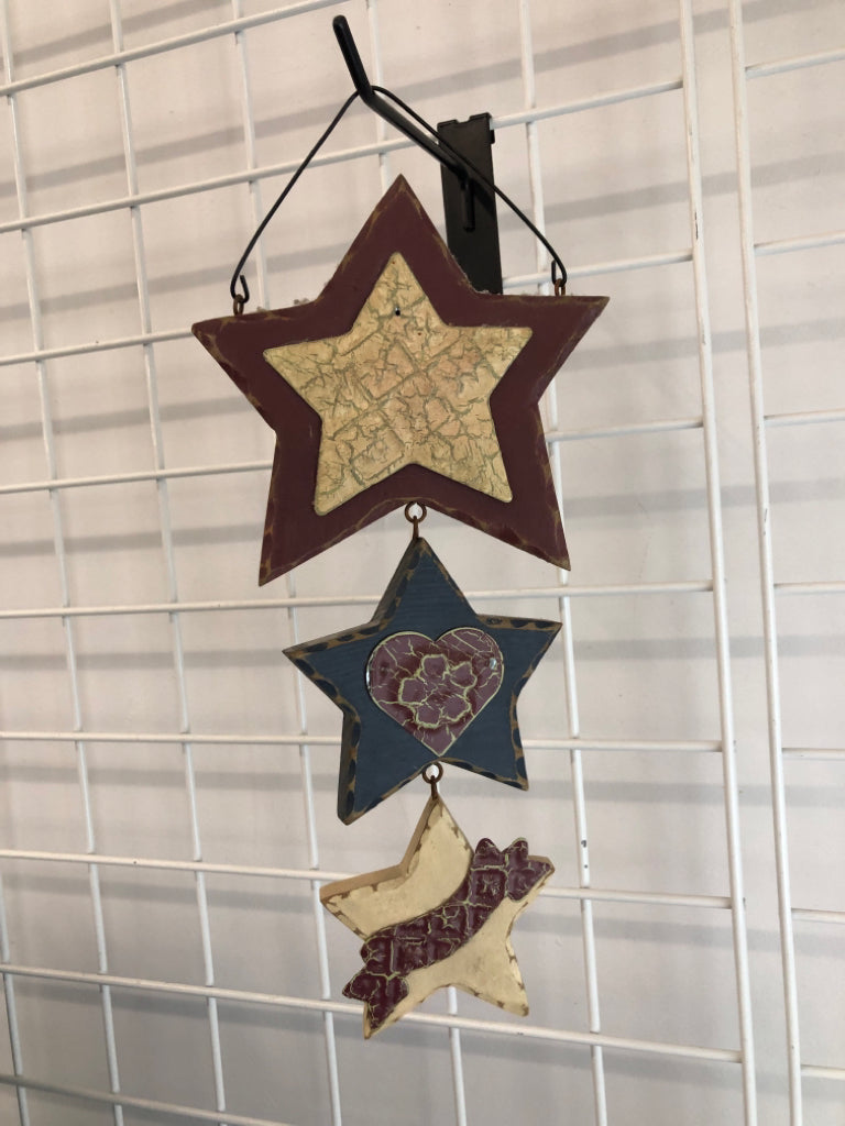 WOOD RED WHITE AND BLUE STAR WALL HANGING.