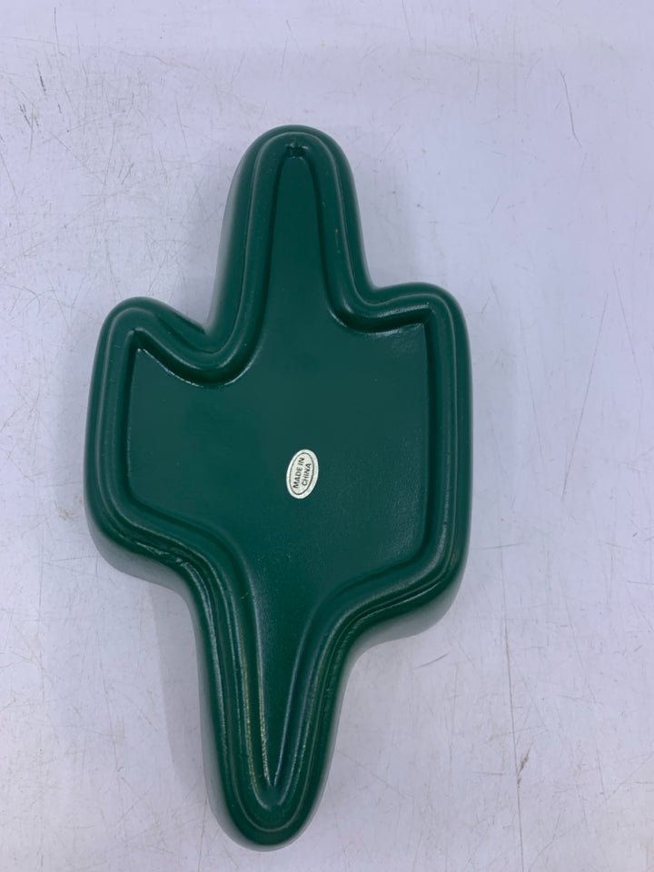 GREEN W/ BROWN INSIDE CACTUS SHAPED BOWL.