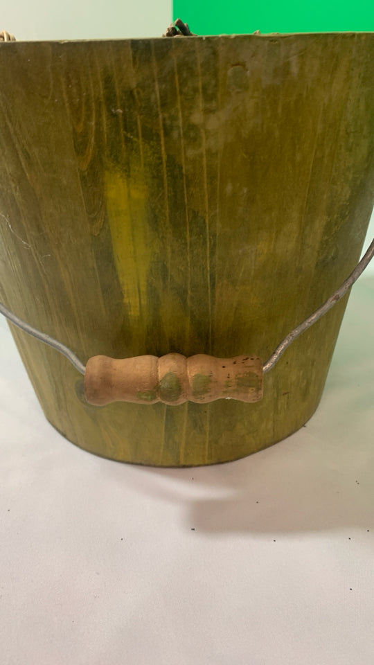 WOOD GREEN BUCKET W/ PAINTED PUMPKIN W/ FILLER INSIDE.