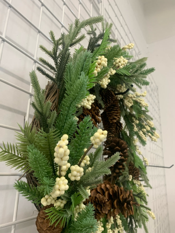 FAUX WREATH W PINECONES AND WHITE PIP BERRIES.