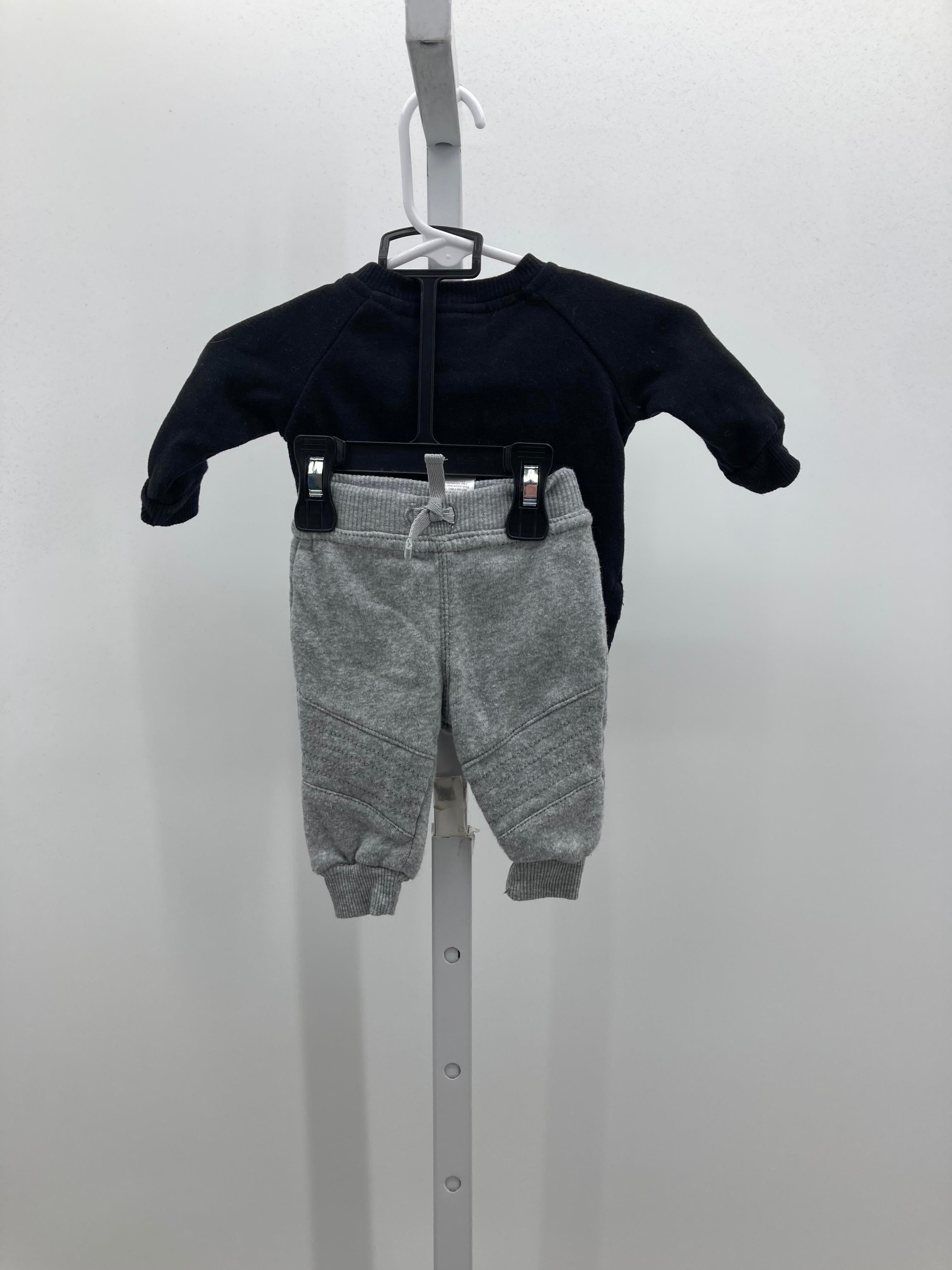 US TOUR 78 SHIRT AND GREY PANTS.