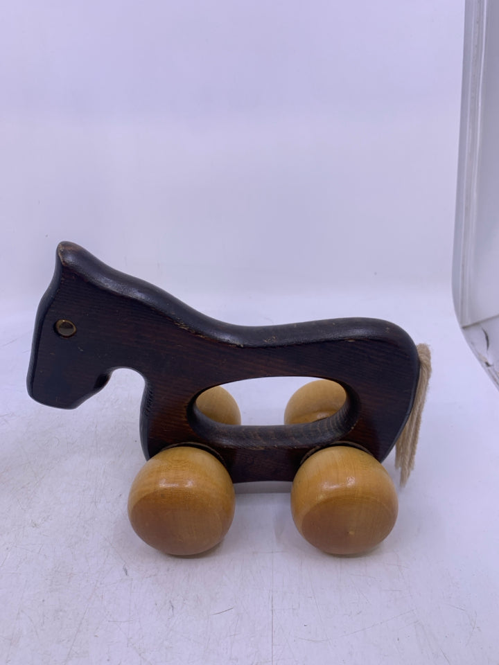 ROLLING 2 TONED WOOD HORSE.