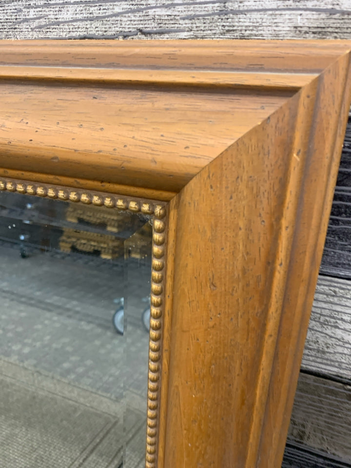 WOOD LARGE HEAVY MIRROR W/ GOLD BEADED INNER EDGE.