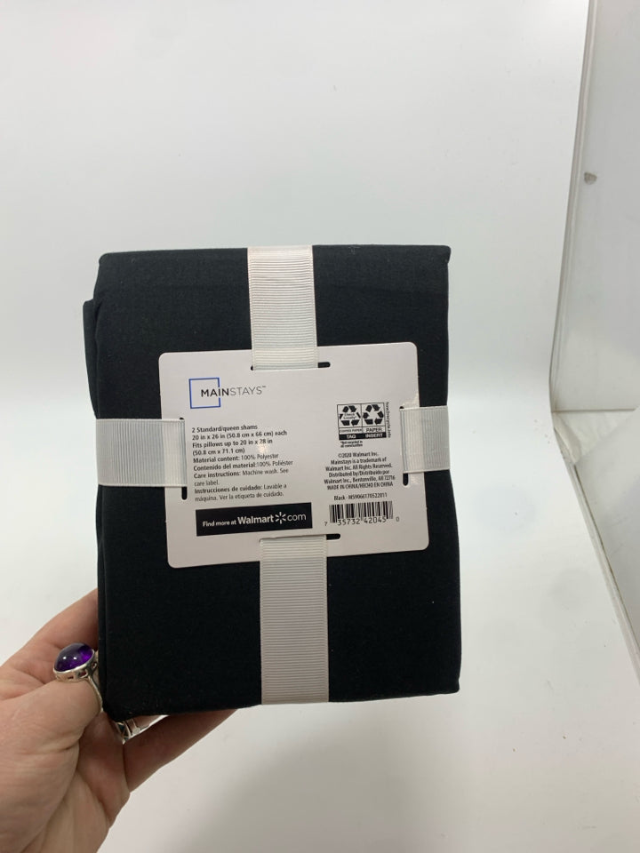 NIP 2 BLACK PILLOW SHAMS.