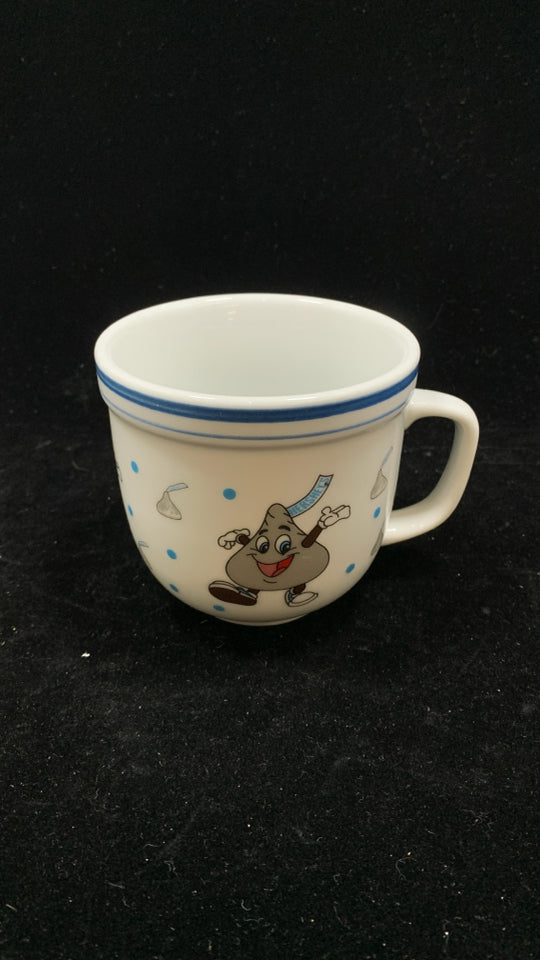 WHITE HERSHEY KISS MUG W BLUE RIM.