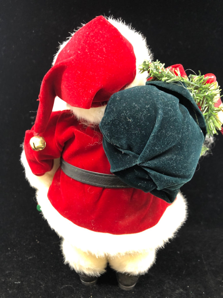 SANTA W/ LONG BEARD VELOUR RED SUIT HOLDING BAG OF PRESENTS.