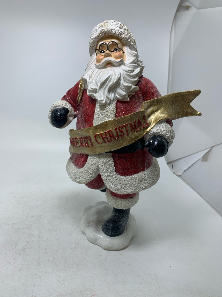 SPARKLE RESIN RUNNING SANTA W/ GOLD MERRY CHRISTMAS BANNER.