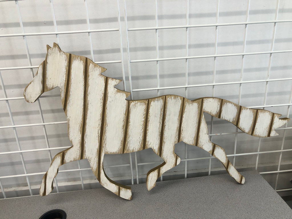 DISTRESSED WOODEN HORSE HANGING.