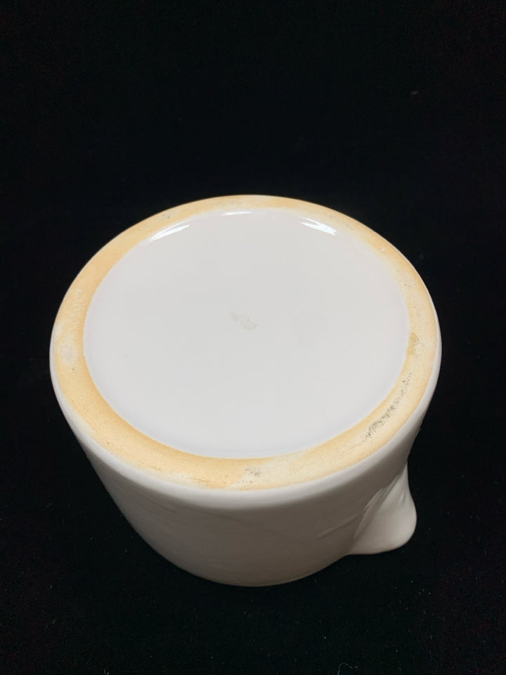 WHITE CERAMIC MEASURING PITCHER.