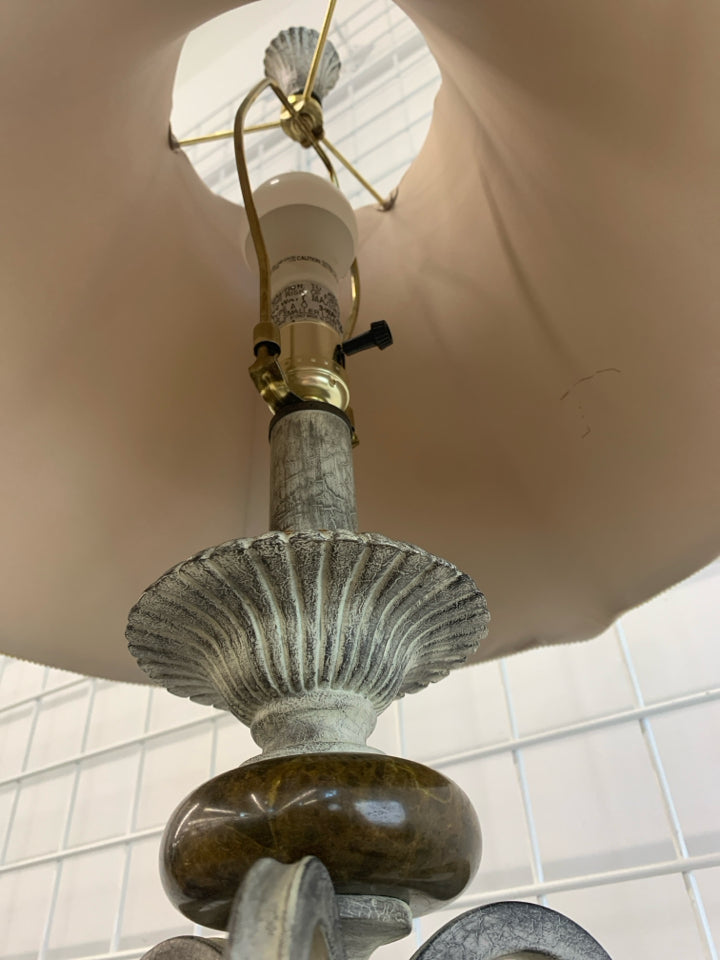 SILVER SCROLL BASE LAMP W/BROWN EMBROIDERED EDGE SHADE.