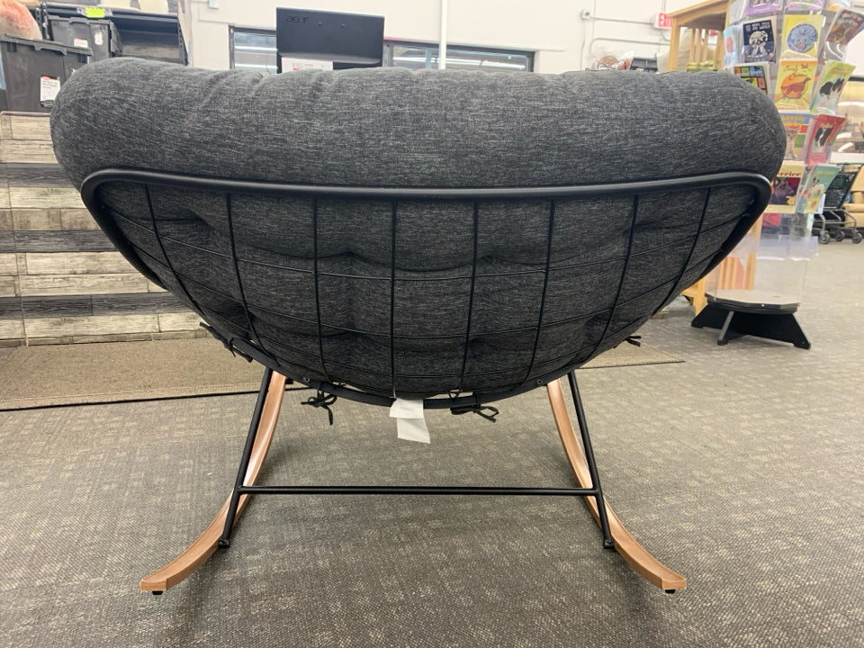 OVERSIZED GRAY PAPASAN ROCKING CHAIR W/WOODEN BASE.
