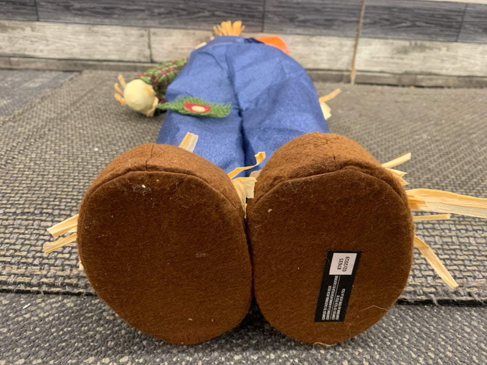 SCARECROW IN BLUE OVERALLS STANDING DECOR.