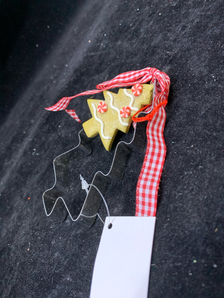 SILVER METAL TREE COOKIE CUTTER ORNAMENT.