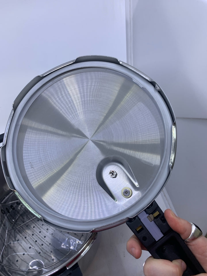 NEW FAGOR STAINLESS STEEL PRESSURE COOKER.