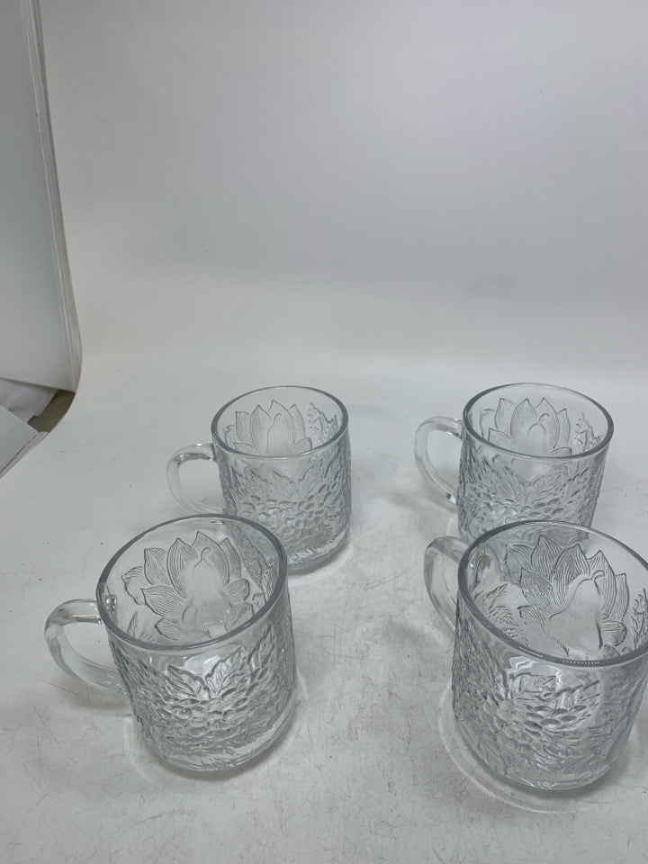 4 EMBOSSED ASSORTED FRUIT MUGS.