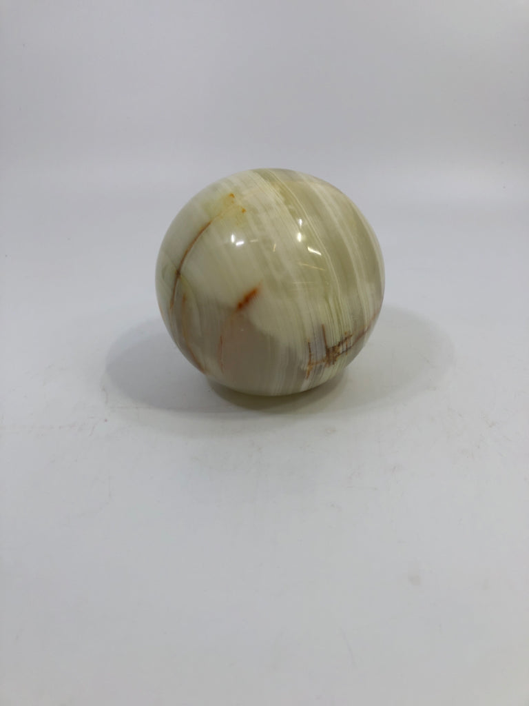 WHITE CREAM AND GREEN HUES SPHERE ONYX PAPER WEIGHT.