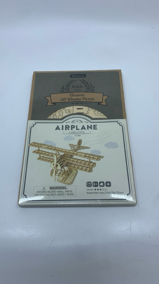 NIP AIRPLANE WOOD PUZZLE.