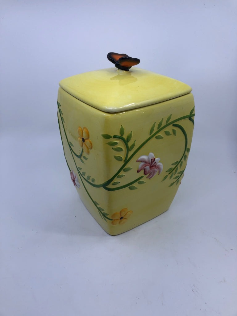 YELLOW FLORAL W BUTTERFLY CANISTER.
