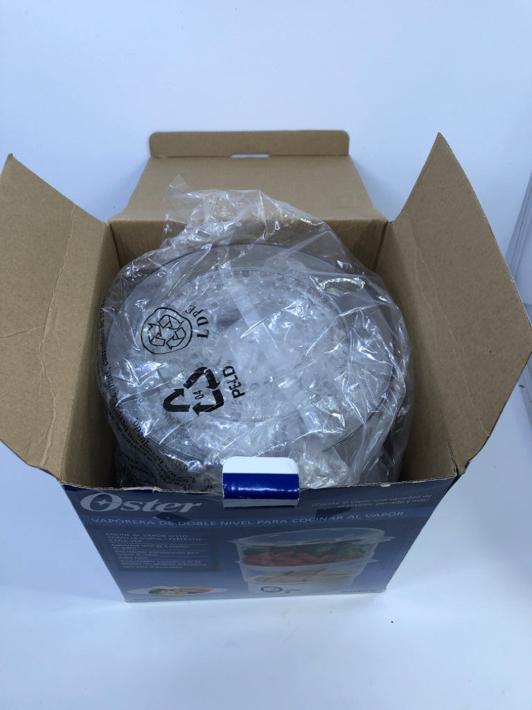 NIB OSTER DOUBLE TIERED FOOD STEAMER.