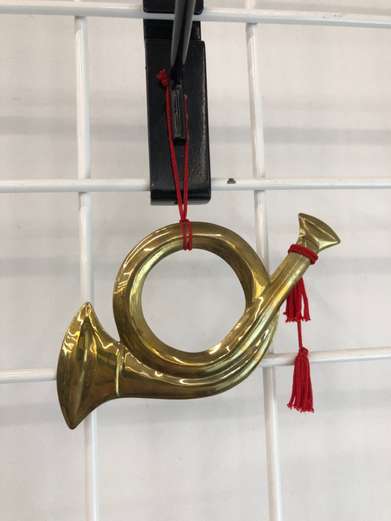 TRUMPET SHAPED BRONZE ORNAMENT.