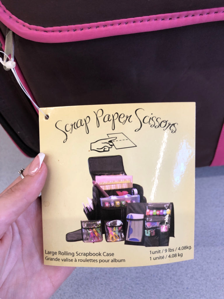 PINK AND BROWN ROLLING SCRAPBOOK CASE.