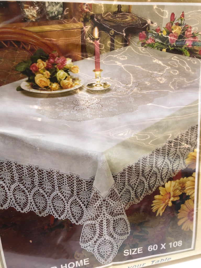 NIP CROCHET VINYL LACE TABLE CLOTH.