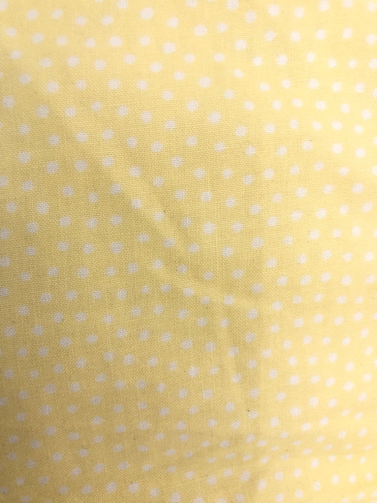 SMALL YELLOW POLKA DOT PILLOW.