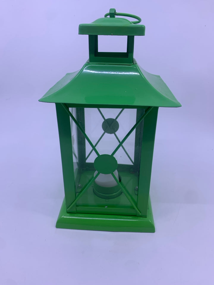 GREEN METAL TEA LIGHT LANTERN.